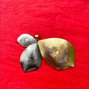 Elegant Gold and Silver Leaf Pendant